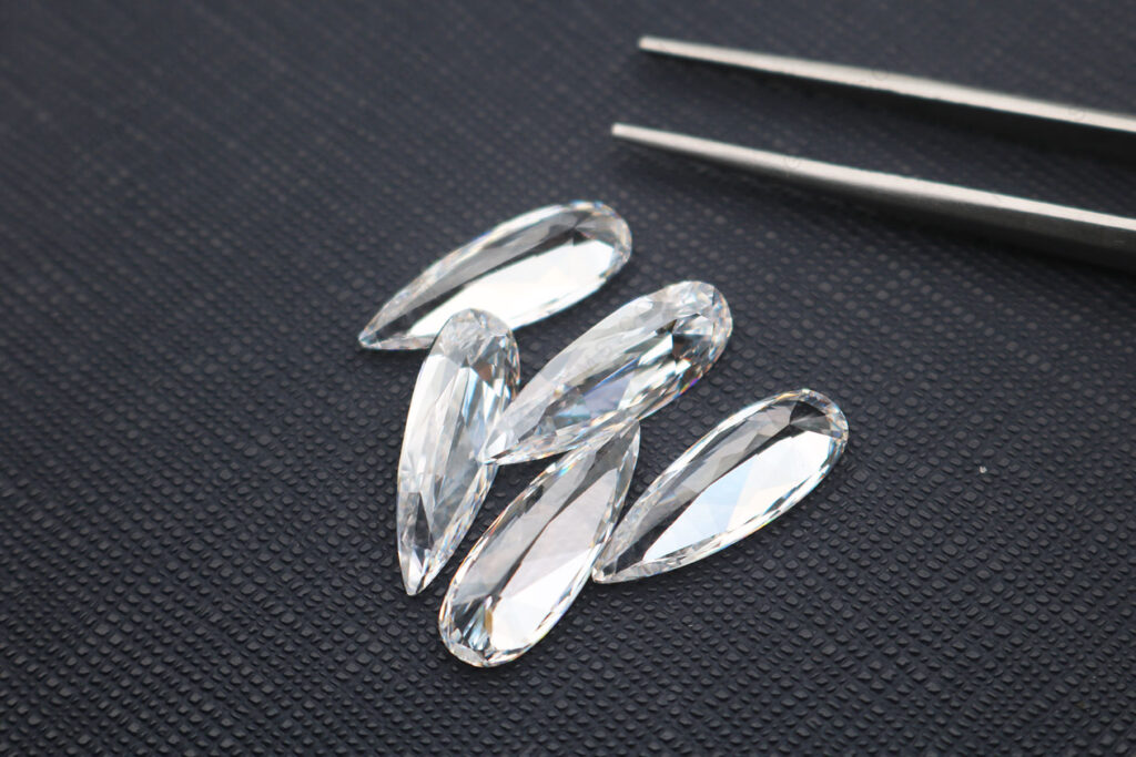 AAAAA-Best-quality-Cubic-Zirconia-White-Clear-Color-custom-pear-shaped-faceted-19x7mm-loose-Gemstones-China-Suppliers-MG_7619