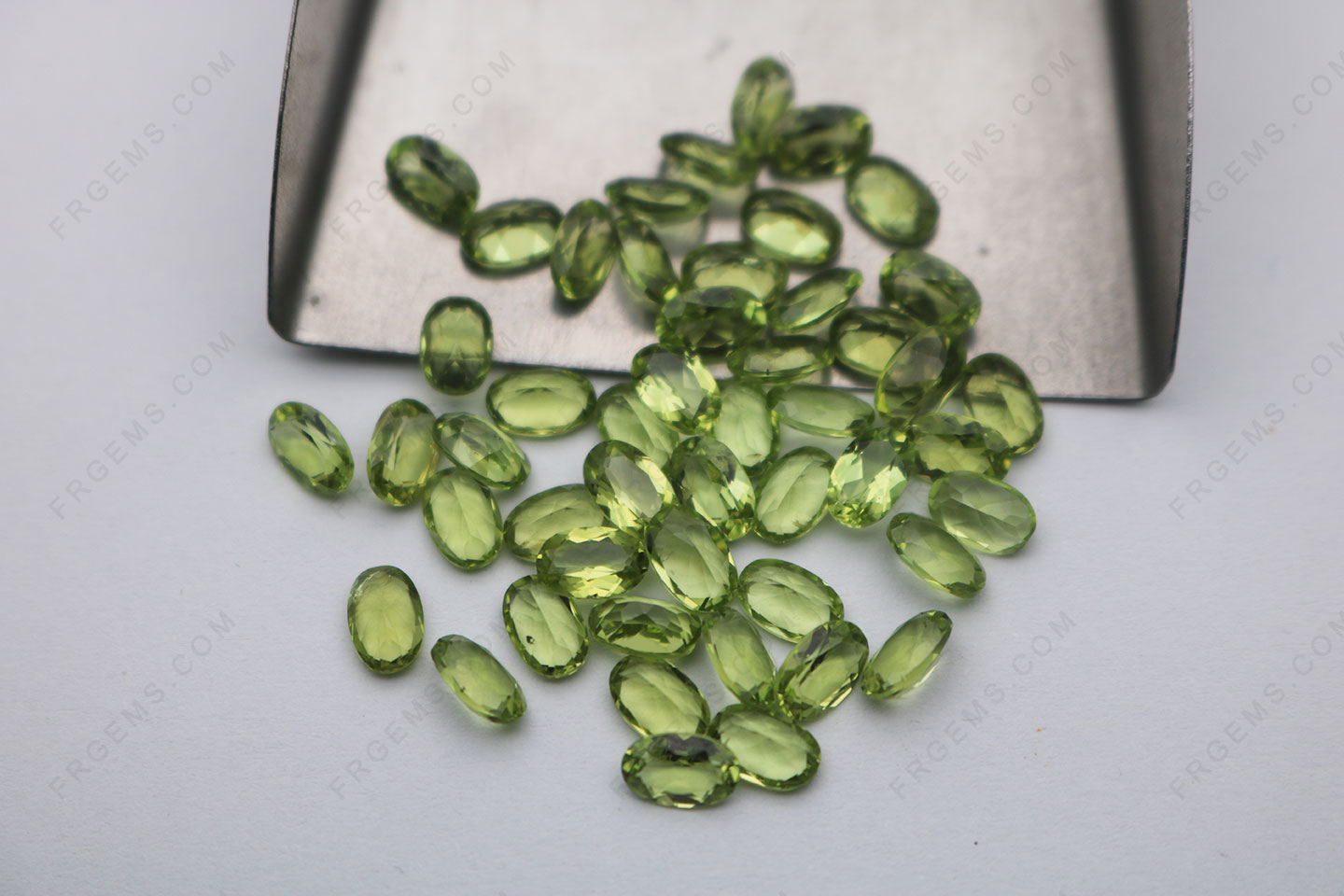 Bulk wholesale Natural Genuine Peridot Oval Shape 6x4mm Faceted Loose Gemstones China Suppliers