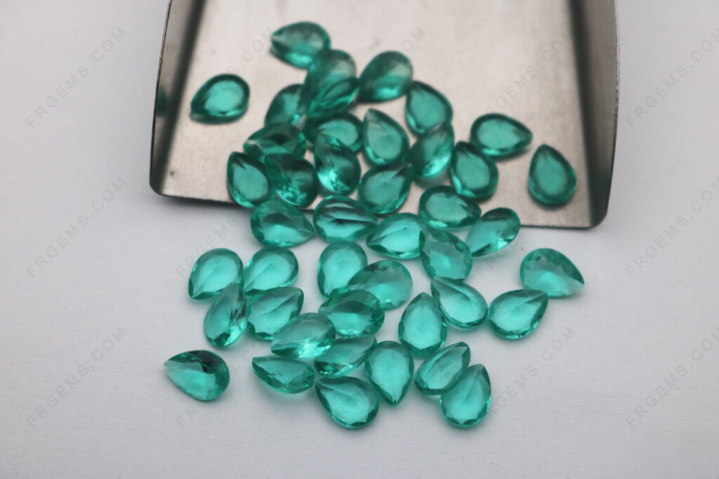 Glass-paraiba tourmaline-Color-T08#-Pear-Shape-faceted-cut-7x5mm-faceted-loose-Gemstones-Wholesale-China-IMG_7598