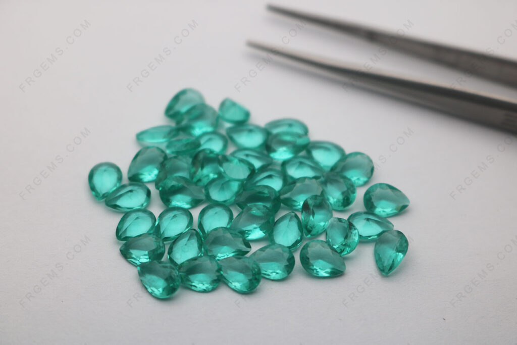 Loose-Glass-paraiba tourmaline-Color-T08#-Pear-Shape-faceted-cut-7x5mm-Gemstones-China-Manufacturers-IMG_7599